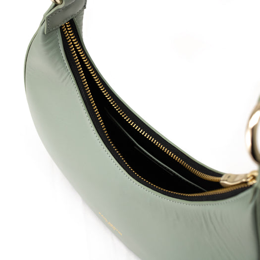 la fermeture eclair doré du sac demi lune