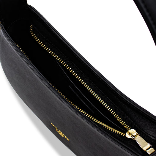 la fermeture eclair doré du sac