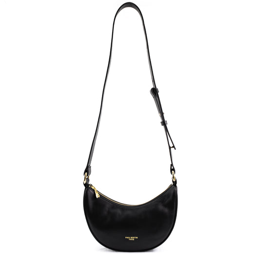 la bandouliére en cuir du sac 
